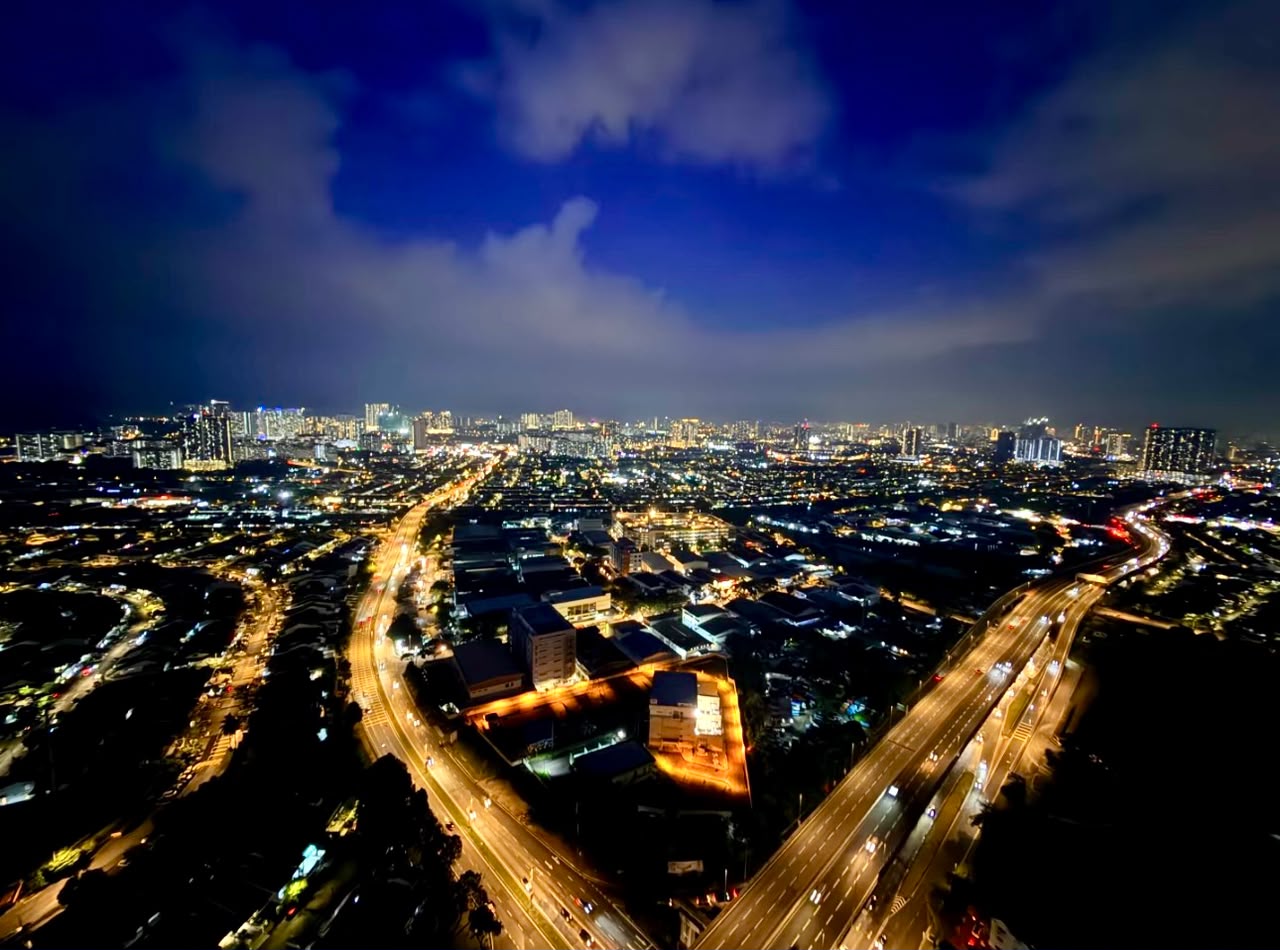 Night-time city panorama photographed from the unit